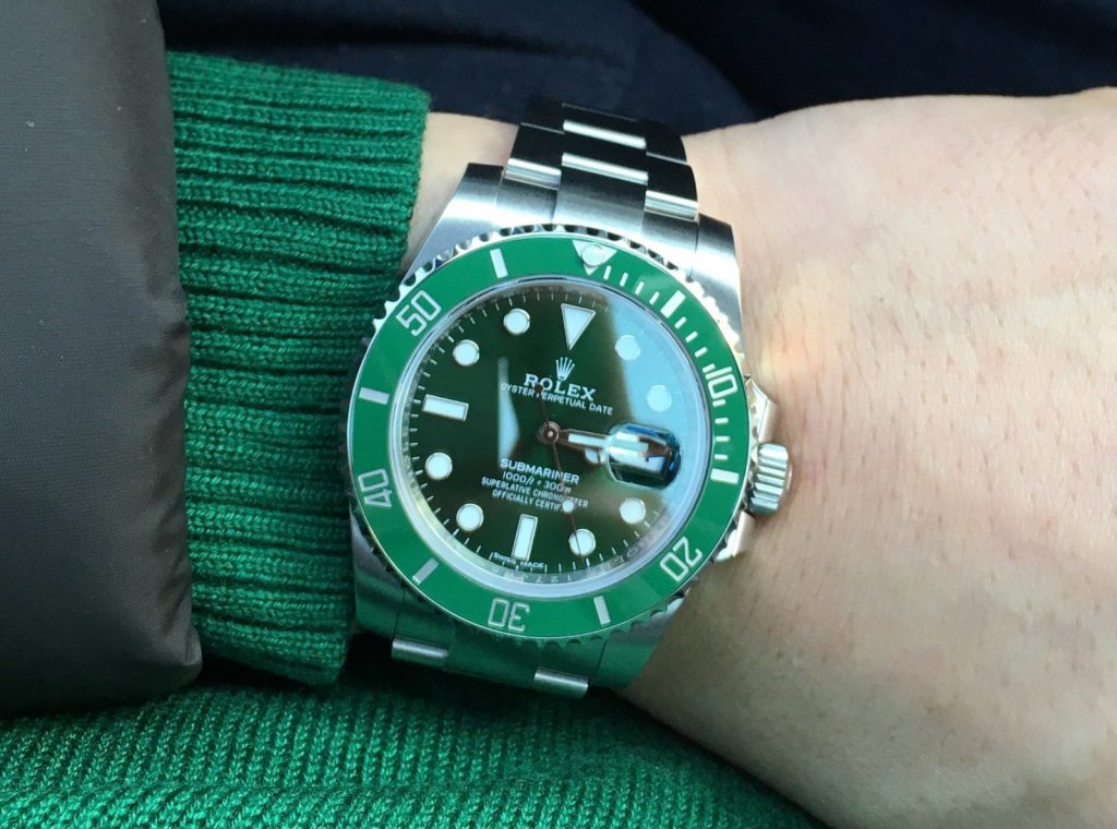 The green dial fake Rolex Submariner is eye-catching.