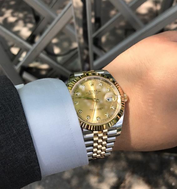 The luxury fake watches have diamond hour marks.